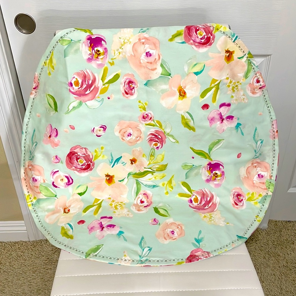Round floral table cover with detailed stitch, 30” in diameter